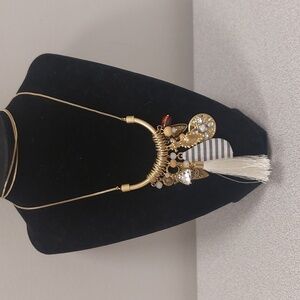 Plunder Gold Tone Charm Tassle Necklace